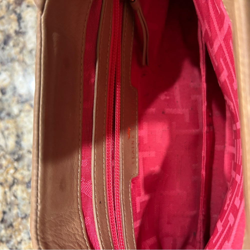 Elaine Turner leather clutch